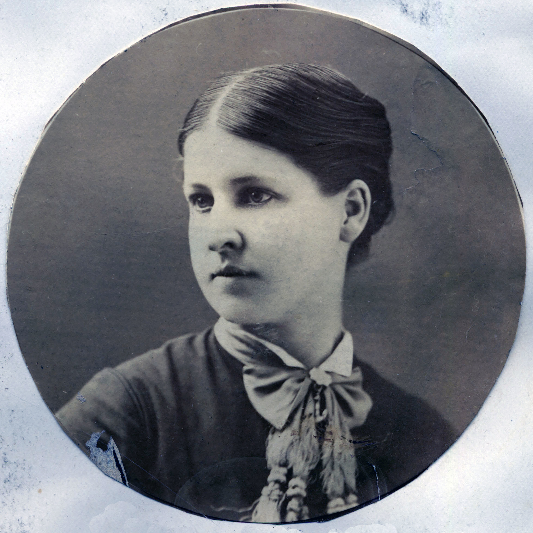 Circular portrait of museum founder Laura Hecox.