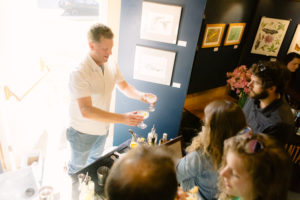 Mixologist at a museum event