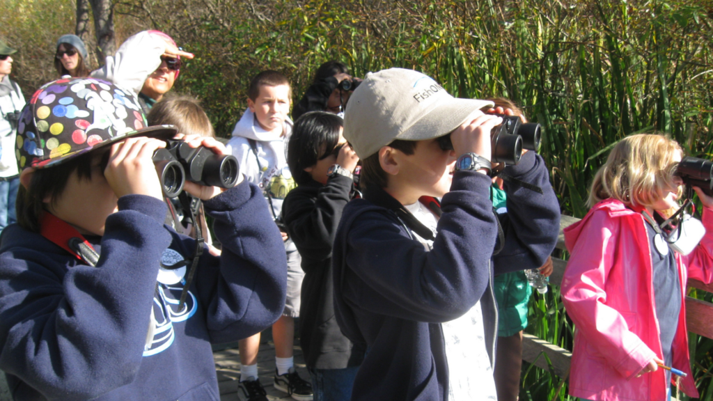 Students with binoculars