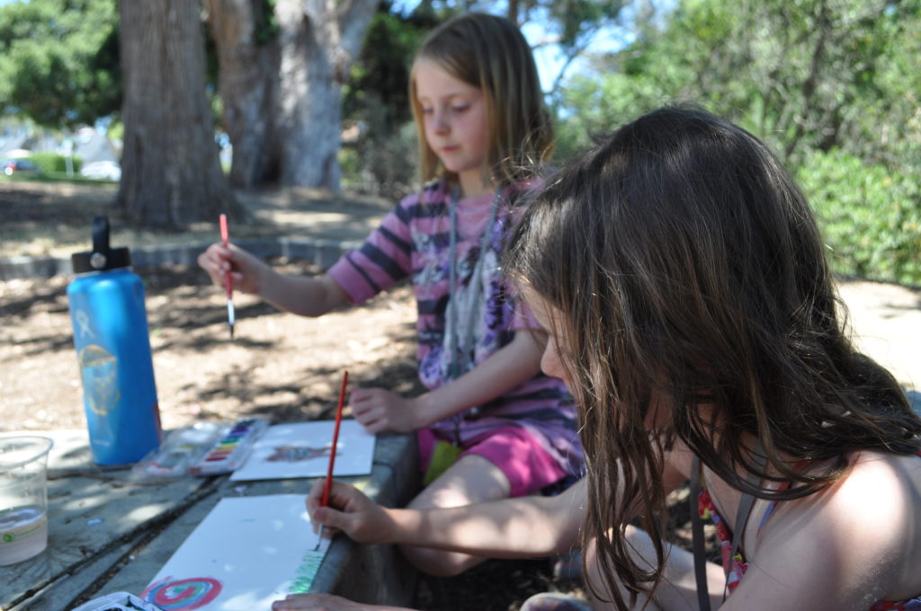 Children painting with watercolors