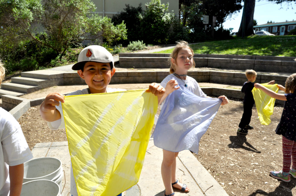 Children doing activities in the museum amphitheater