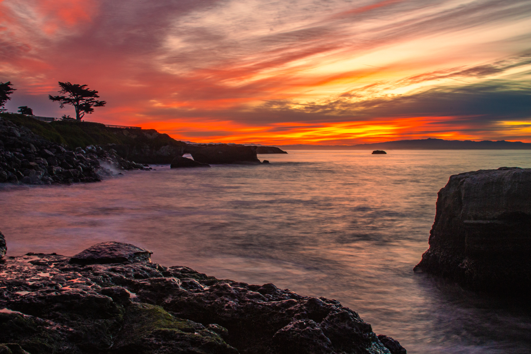 A pink sky over the ocean.
