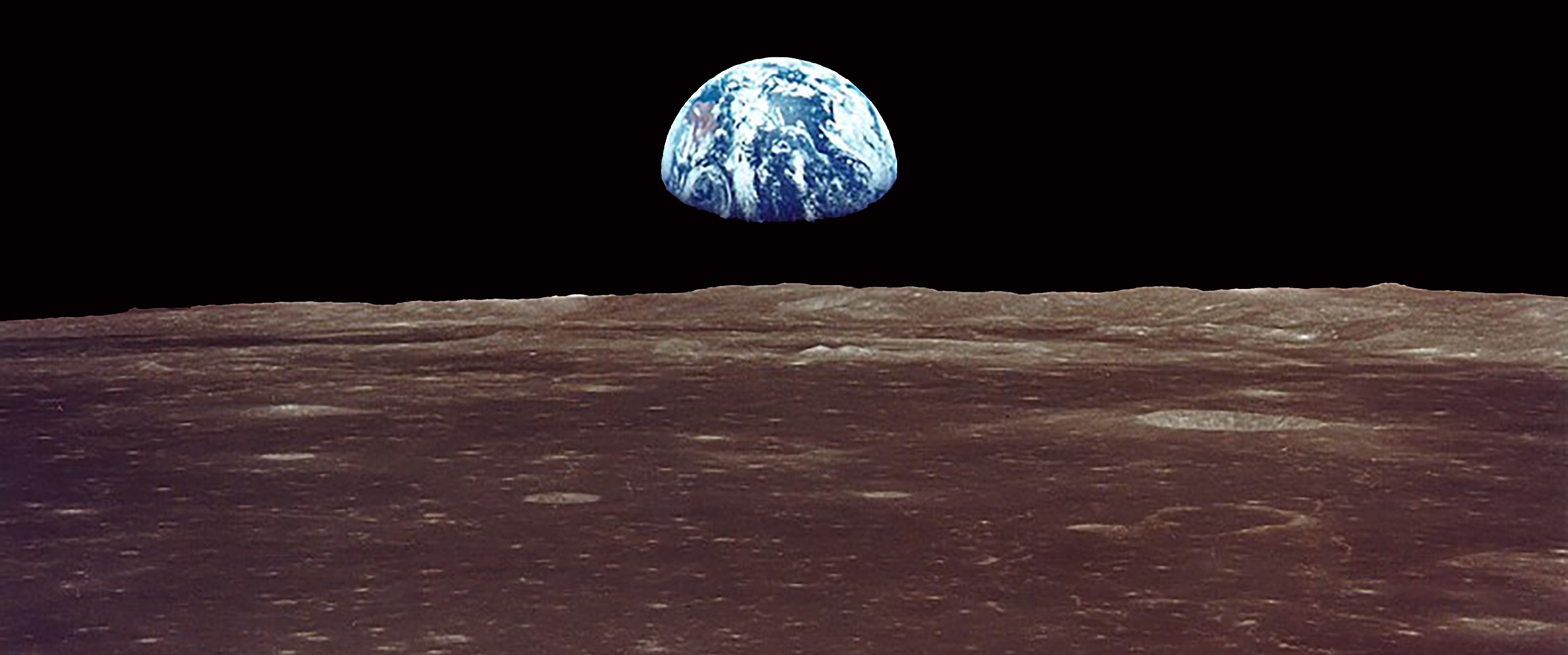 The earth rises over the surface of the moon.