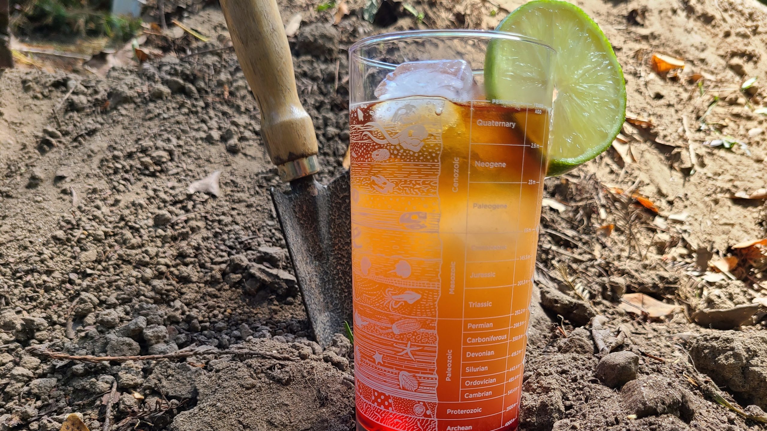 A layered cocktail in a highball glass